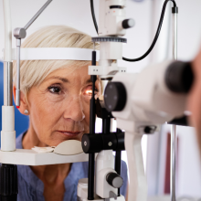 Optometrist measuring patient's vision
