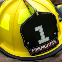 firefighting helmet lying on a turnout coat