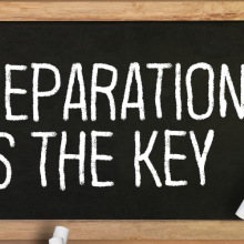 sign reading "preparation is the key"
