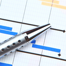 project spreadsheet with pen