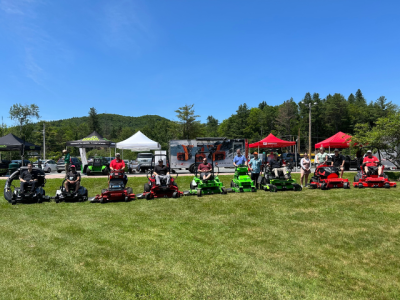photo of nine different electric riding mowers from 5 companies