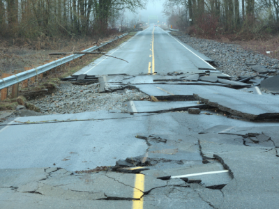 broken pavement on flood damaged highway