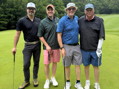 team photo of the 2026 winners on the course