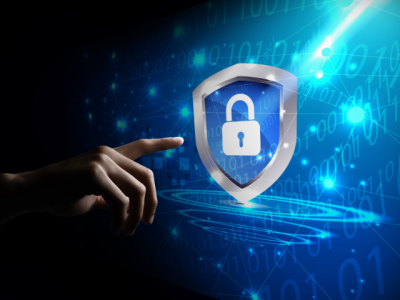 hand touching a cybersecurity shield