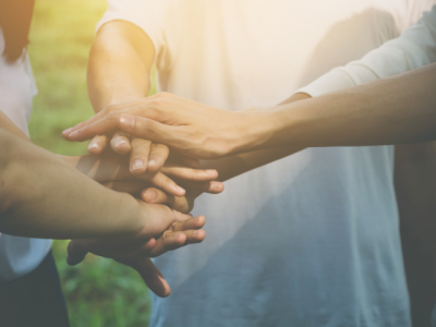 Volunteer hands together