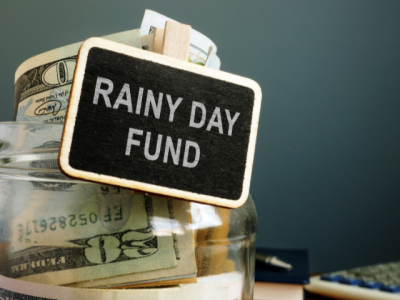 rainy day fund savings jar with cash