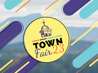 "Town Fair 23" logo on a fun background