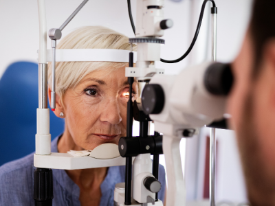 Optometrist measuring patient's vision