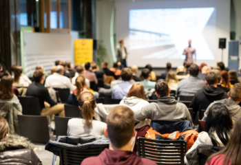 speaker presenting to audience