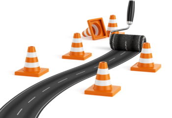 highway construction cones and pavement