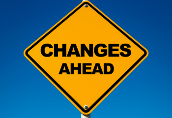 yellow caution sign reading "Changes Ahead"