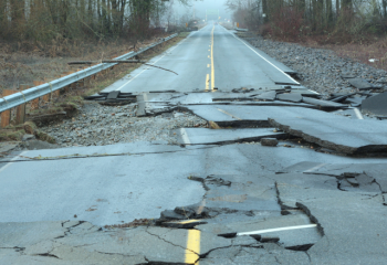broken pavement on flood damaged highway