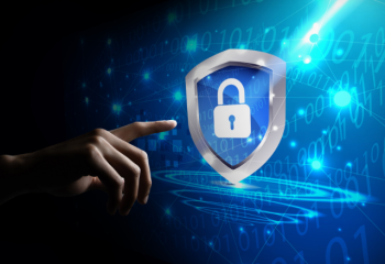 hand touching a cybersecurity shield