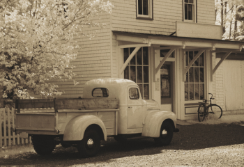 historic general store with pickup truck