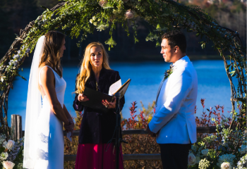 photo of bride and groom saying vows with a not-visibly-religious officiant
