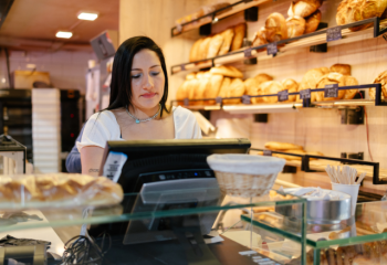 photo of cashier at a bakery