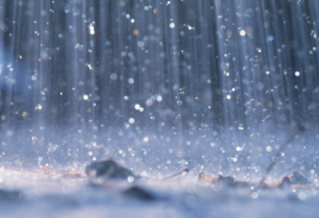photo of rain on pavement