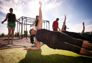 women exercising in a park