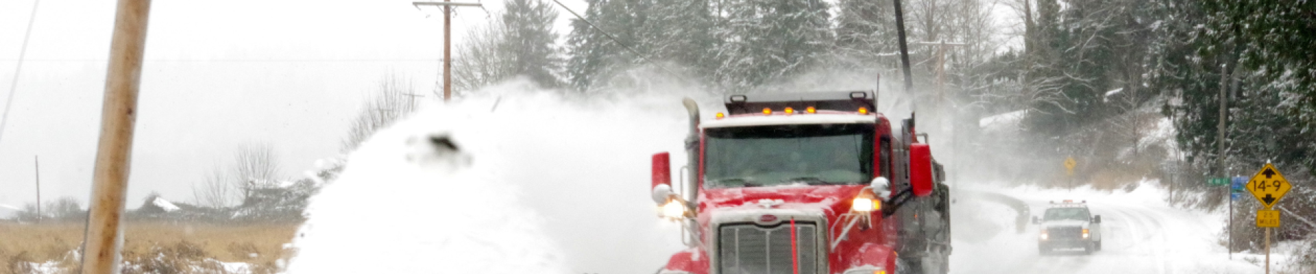 plow truck plowing snow