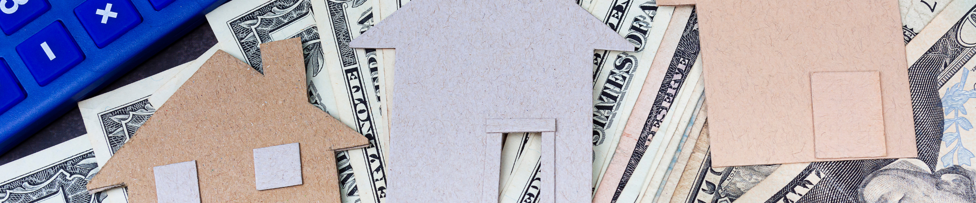 dollar bills overlain by cutouts of house shapes