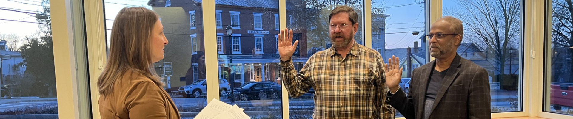 Two selectboard members being sworn in