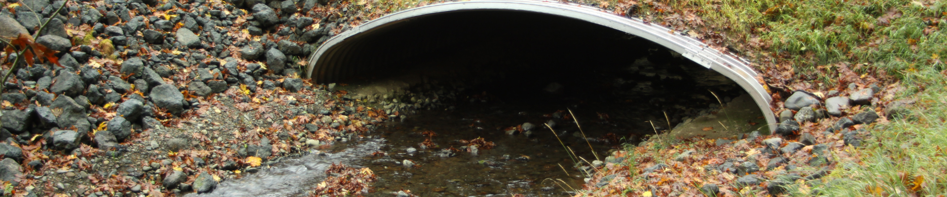 metal arch culvert with stream