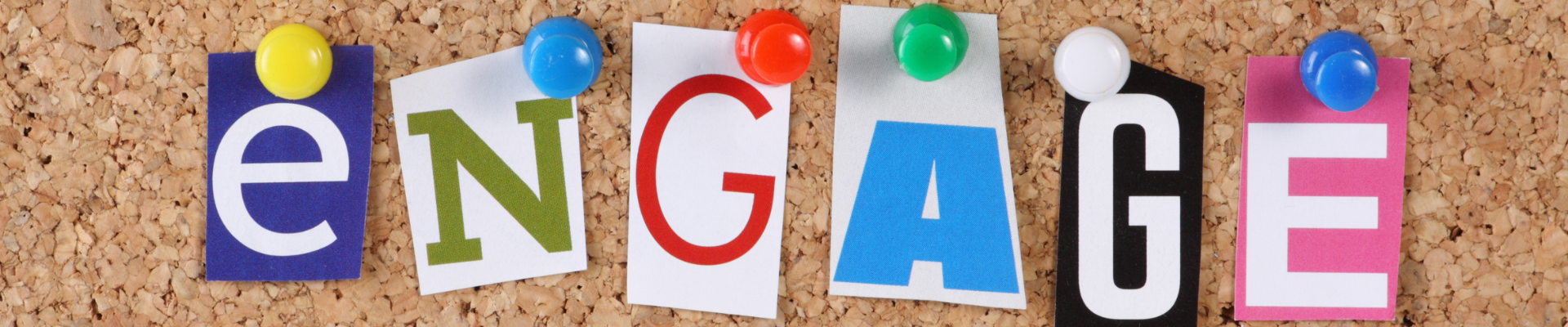 the word Engage in cut out magazine letters pinned to a cork notice board