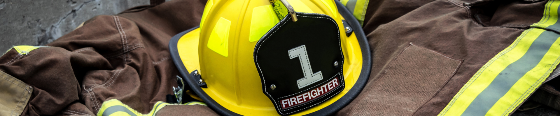 firefighting helmet lying on a turnout coat