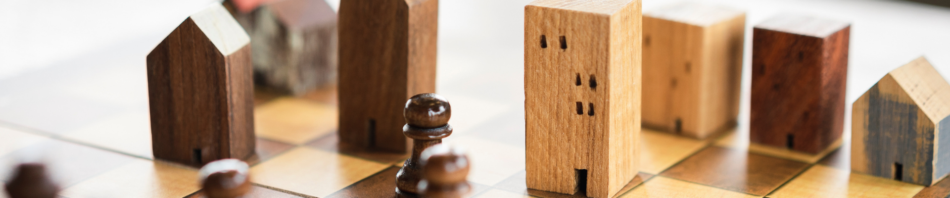 buildings and house models in chess game