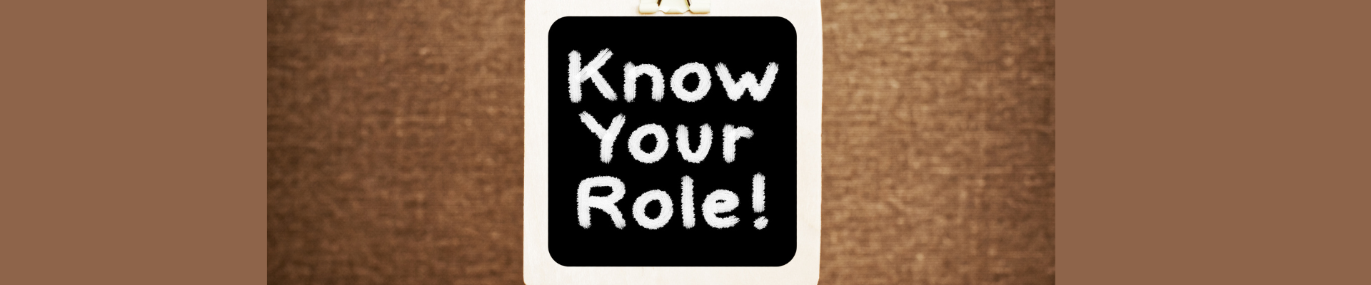 Know Your Role! A business message text written on a chalkboard