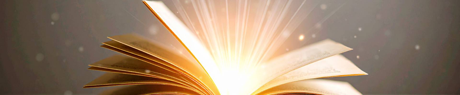 light emitting from the middle of an open book
