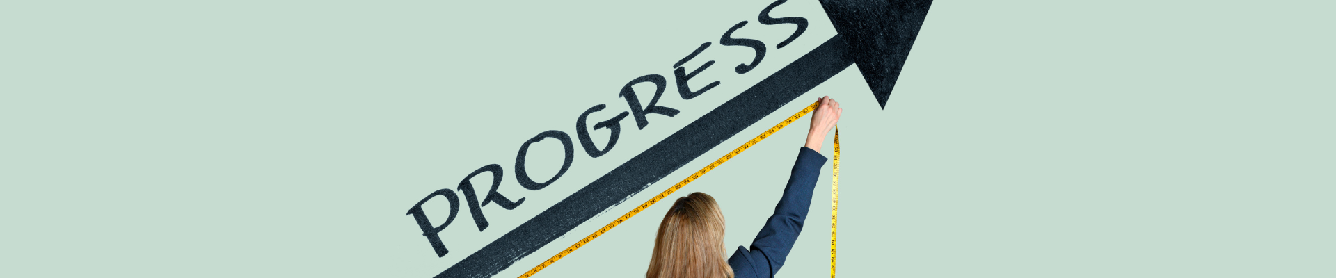 woman measuring "progress" with tape measure