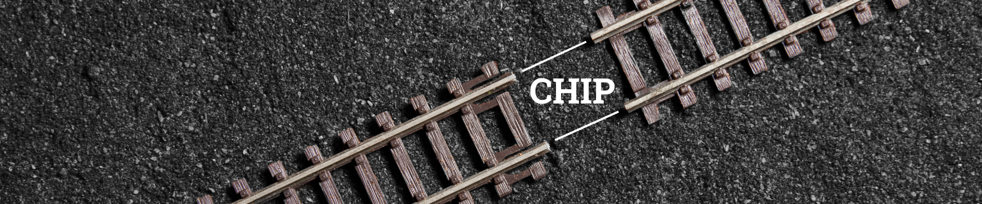 railroad track with gap filled by "CHIP"