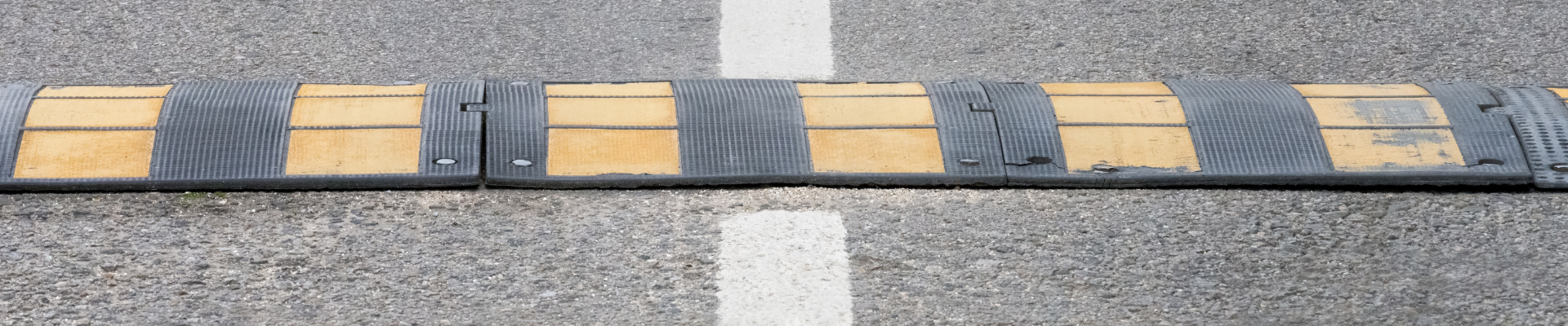 speed hump across the middle of a road