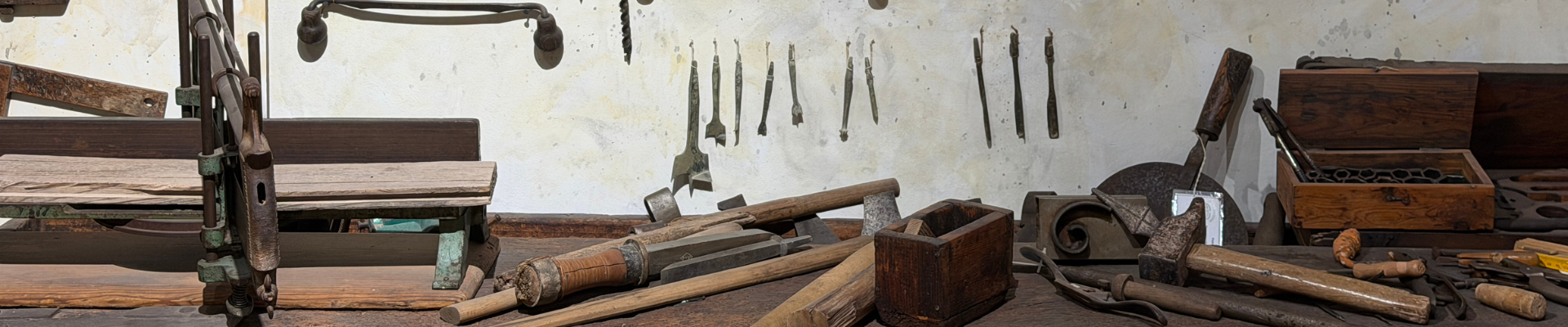 a workbench with woodworking tools