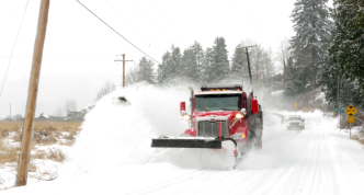 plow truck plowing snow