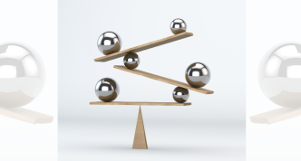 image of layers of ball bearings and boards balanced on the tip of a cone