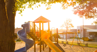 playground structure at sunset