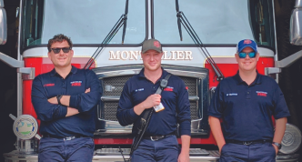 montpelier firemen in front of fire truck