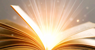 light emitting from the middle of an open book