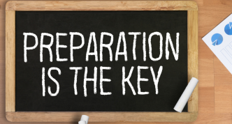 sign reading "preparation is the key"