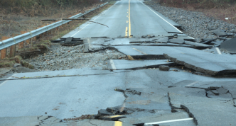 paved road with flood damaged pavement