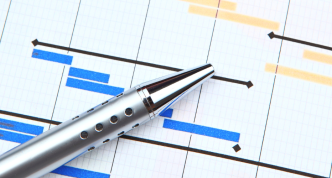 project spreadsheet with pen