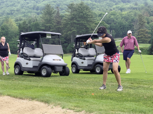 Golfer taking a swing