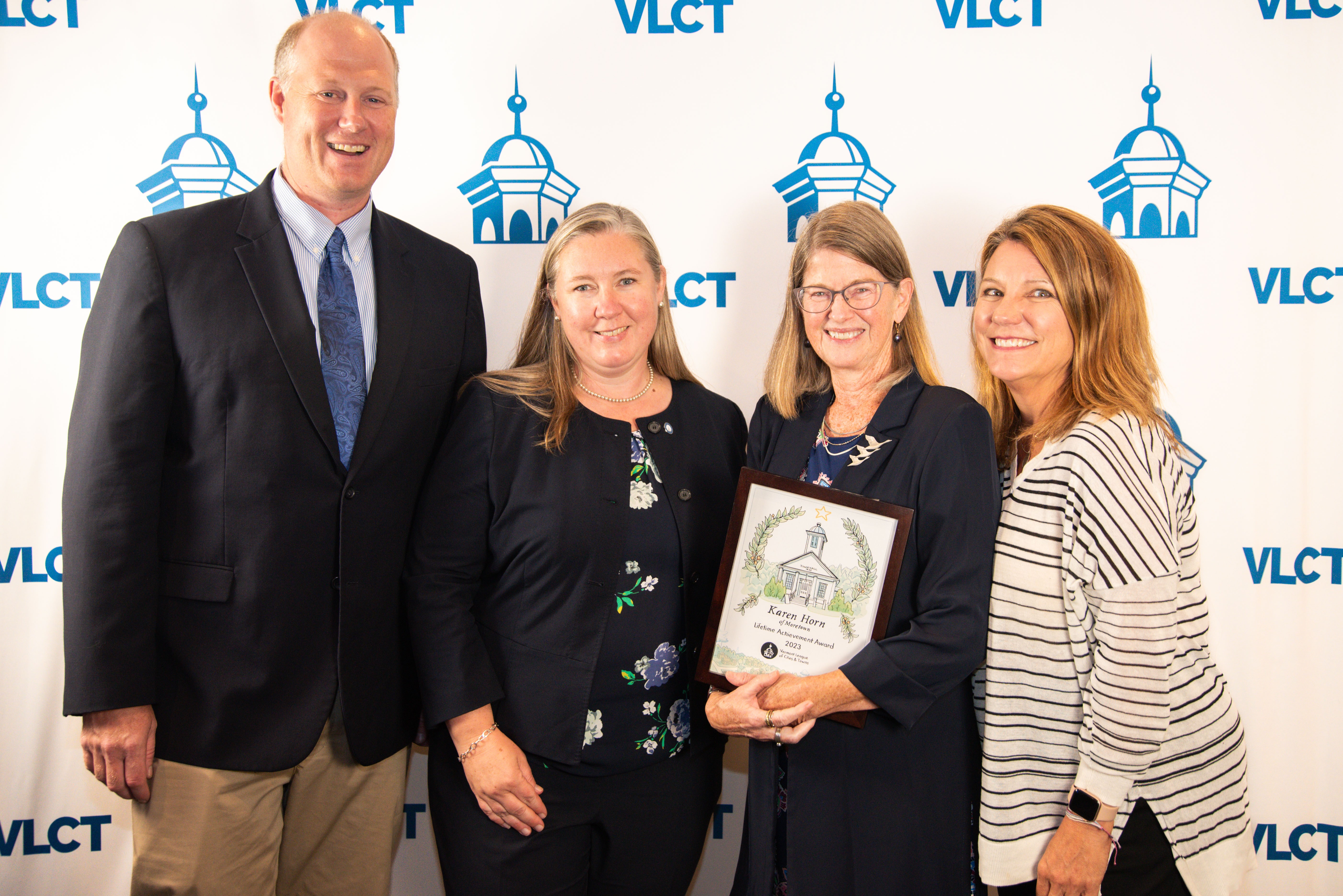 VLCT Executive Director Ted Brady presenting the 2023 VLCT Lifetime Achievement Award to VLCT’s recently retired Director of Public Policy and Advocacy, Karen Horn of Moretown.